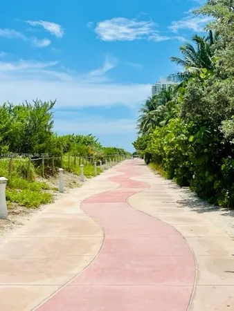 a view of a road with a yard