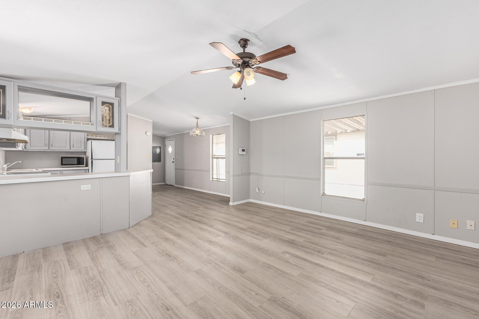 625 West McKellips Road, Unit 330 Mesa, AZ 85201 - Photo 25 of 46 a view of a room with window and a ceiling fan