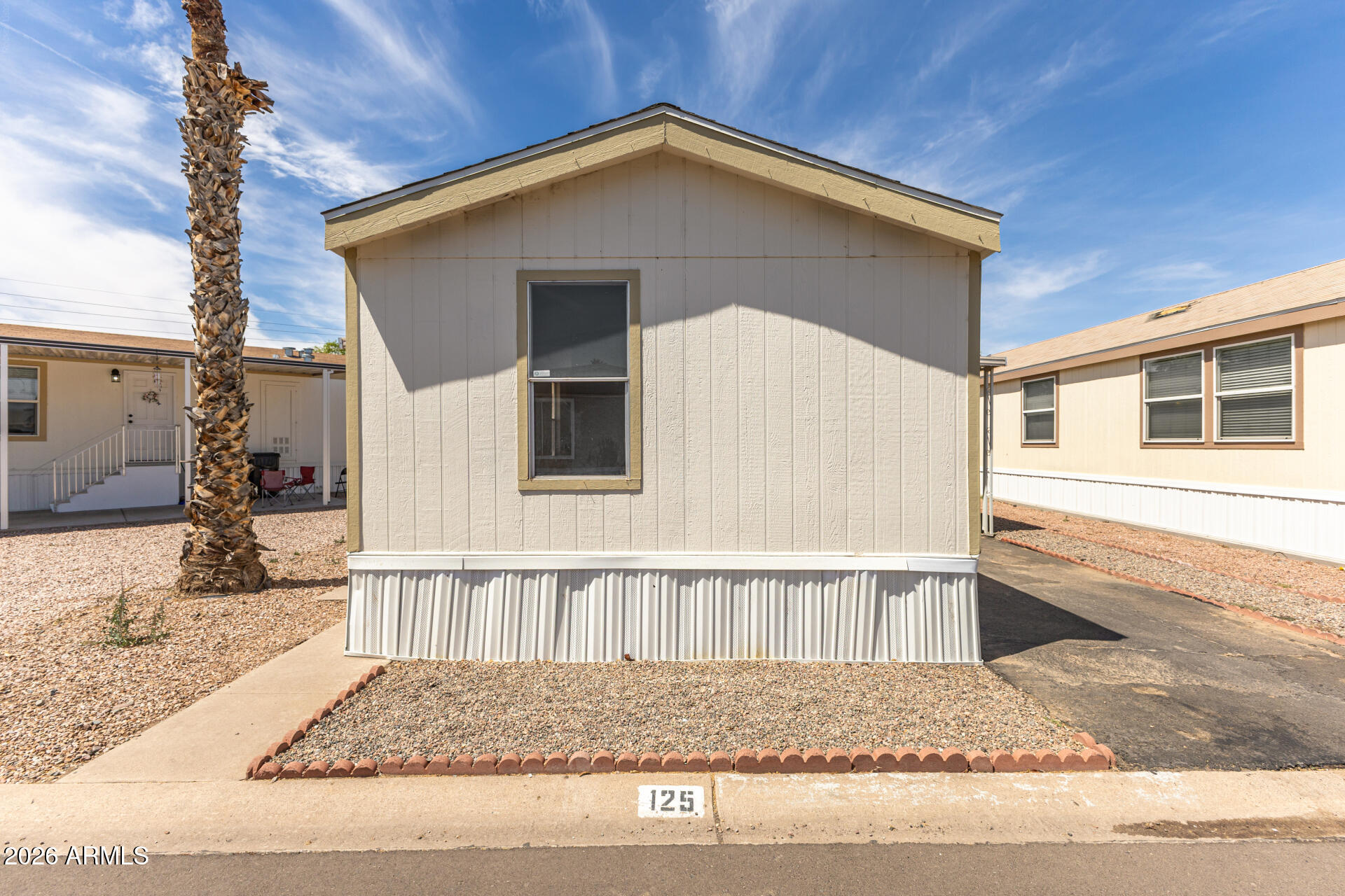 625 West McKellips Road, Unit 330 Mesa, AZ 85201 - Photo 4 of 46 a view of a house with a patio