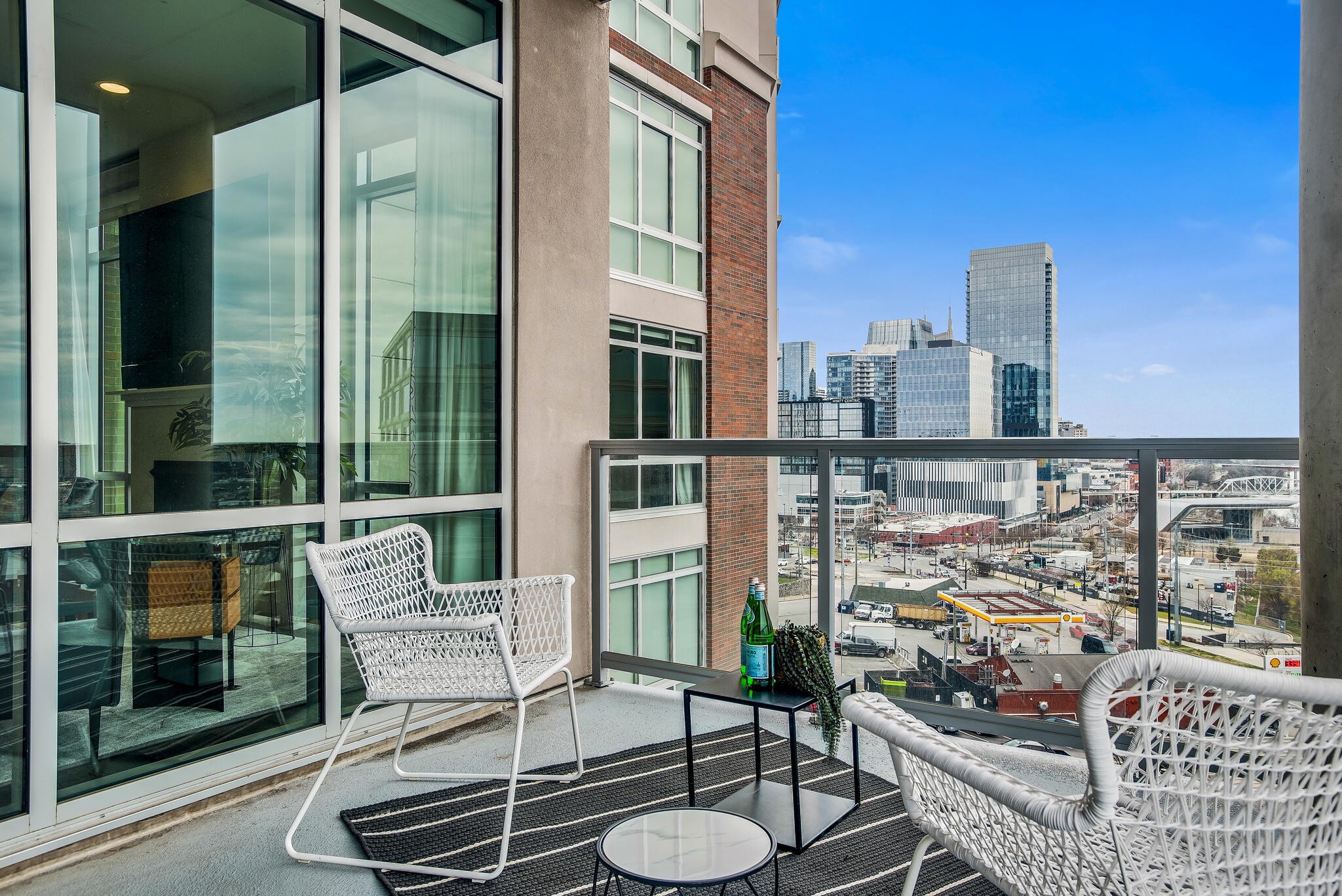 20 Rutledge Street, Unit 407 Nashville, TN 37210 - Photo 17 of 39 a balcony with chairs