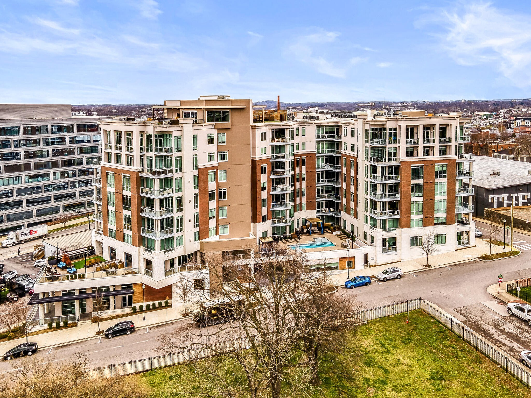 20 Rutledge Street, Unit 407 Nashville, TN 37210 - Photo 2 of 39 a view of a large building with a swimming pool