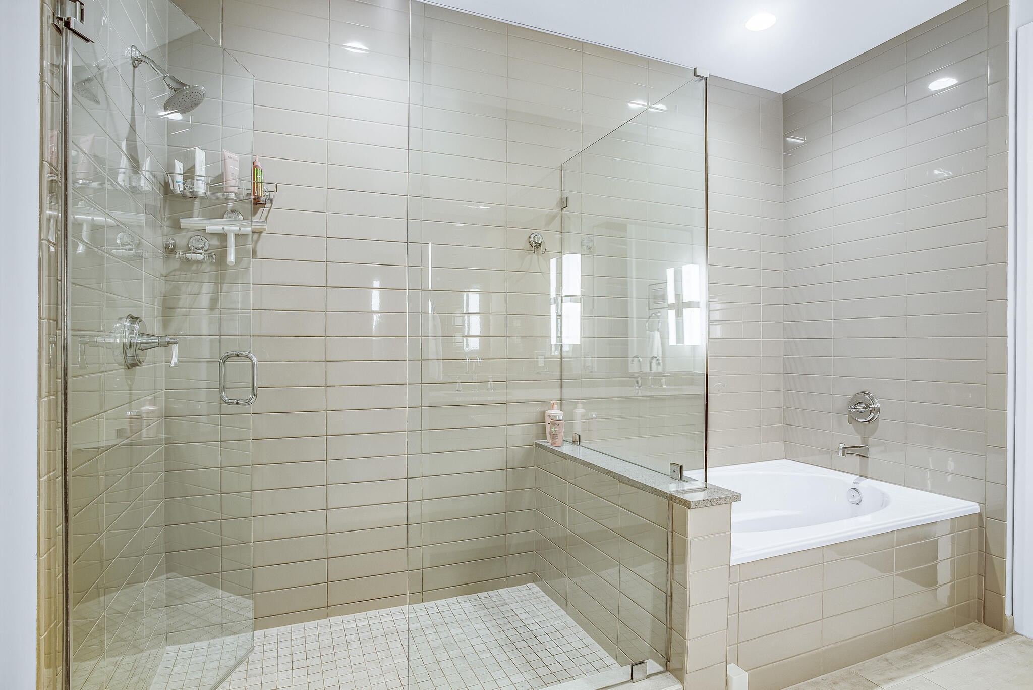 20 Rutledge Street, Unit 407 Nashville, TN 37210 - Photo 22 of 39 a bathroom with a bathtub and a shower