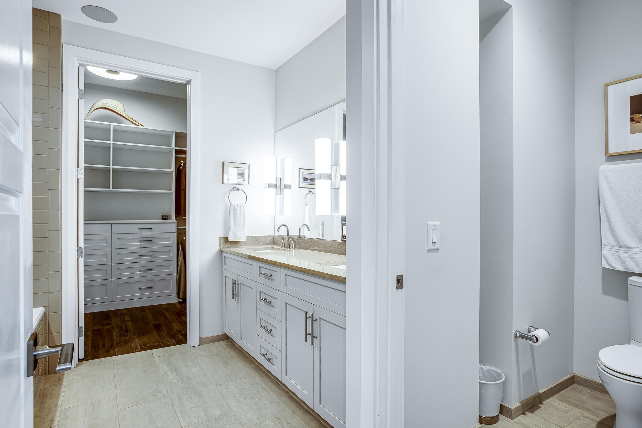 20 Rutledge Street, Unit 407 Nashville, TN 37210 - Photo 24 of 39 a bathroom with a granite countertop sink mirror and toilet