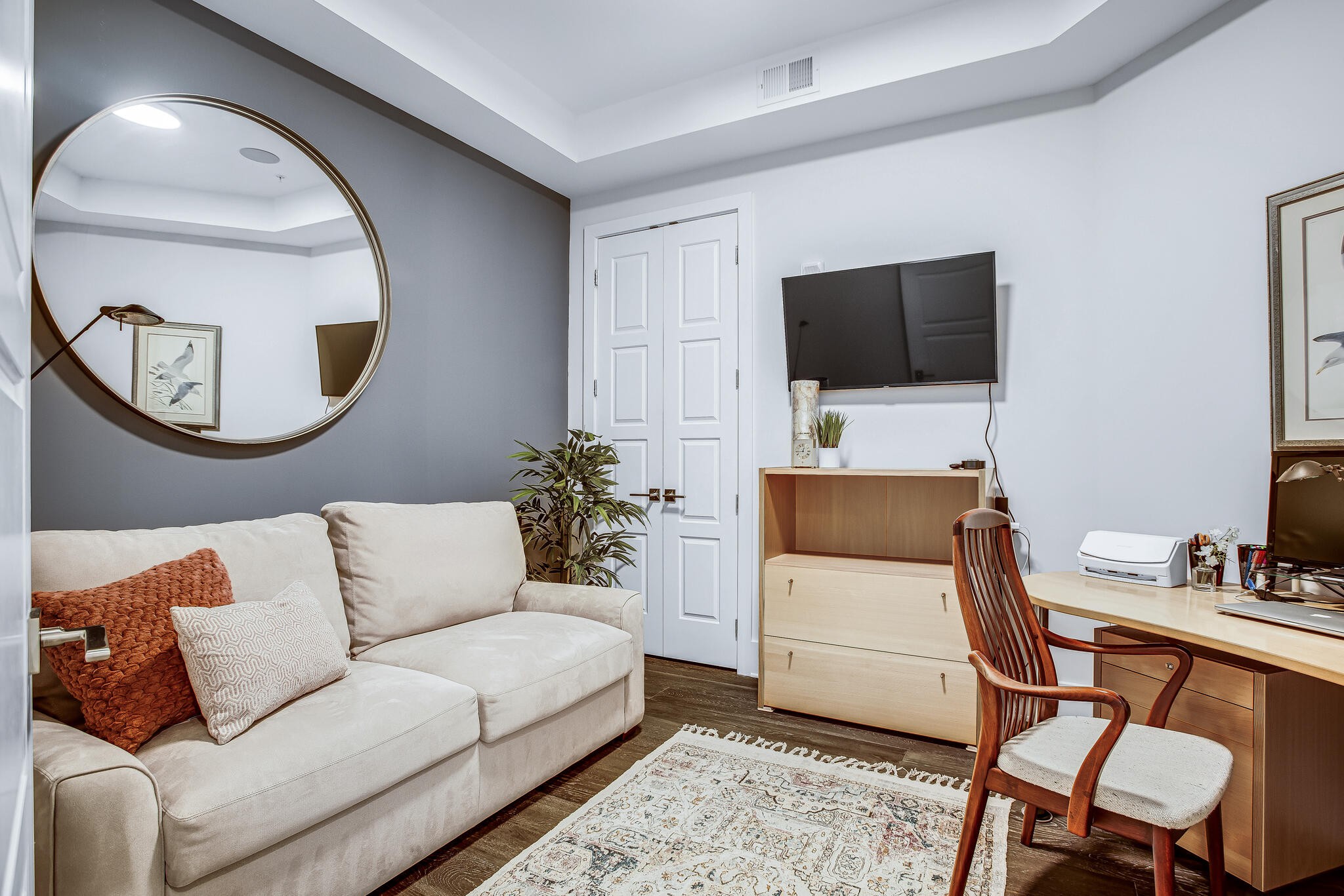 20 Rutledge Street, Unit 407 Nashville, TN 37210 - Photo 26 of 39 a living room with a couch and a flat screen tv