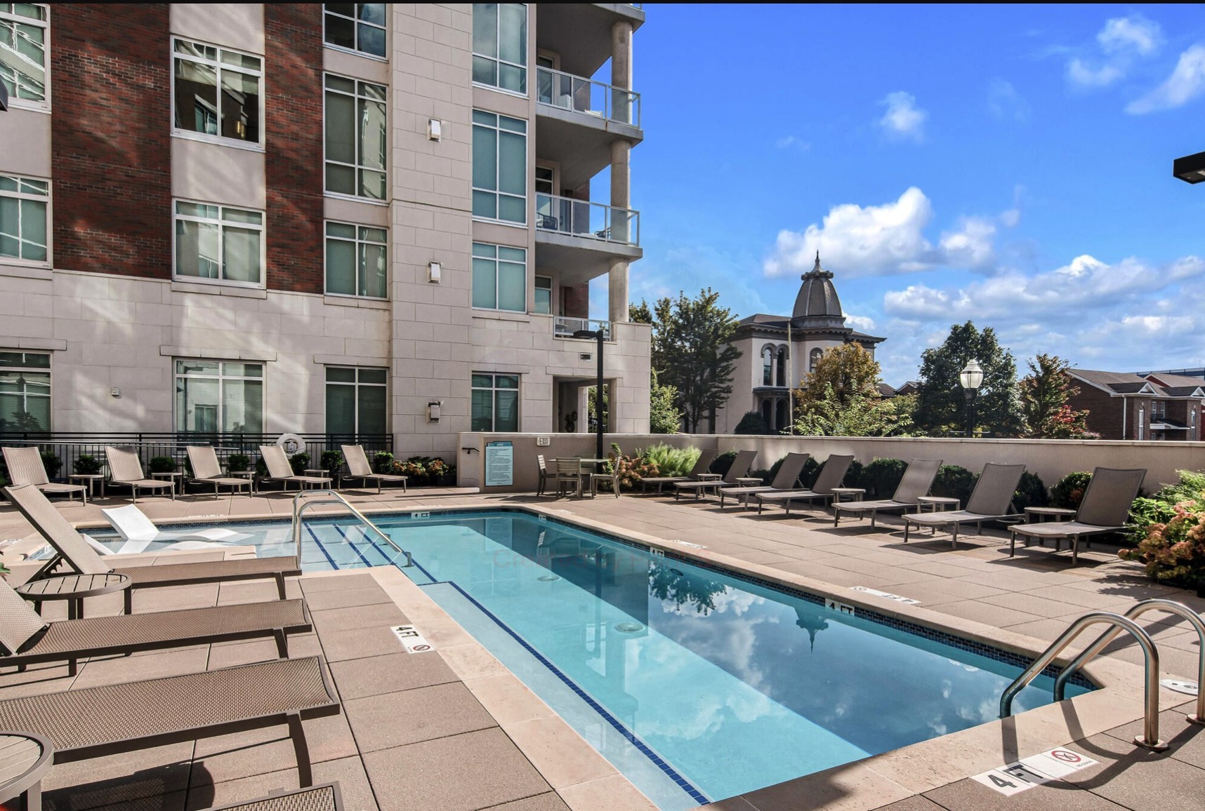 20 Rutledge Street, Unit 407 Nashville, TN 37210 - Photo 38 of 39 a view of a house with swimming pool and sitting area
