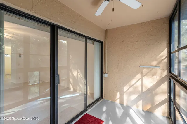 a view of a glass door and window