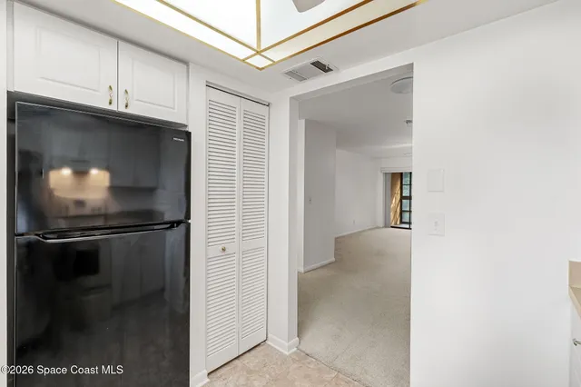 a view of a livingroom with wooden floor