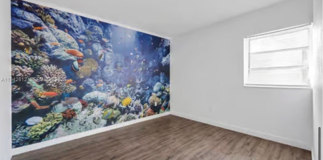 4841 Northwest 7th Street, Unit 3034 Miami, FL 33126 - Photo 18 of 35 wooden floor in a room