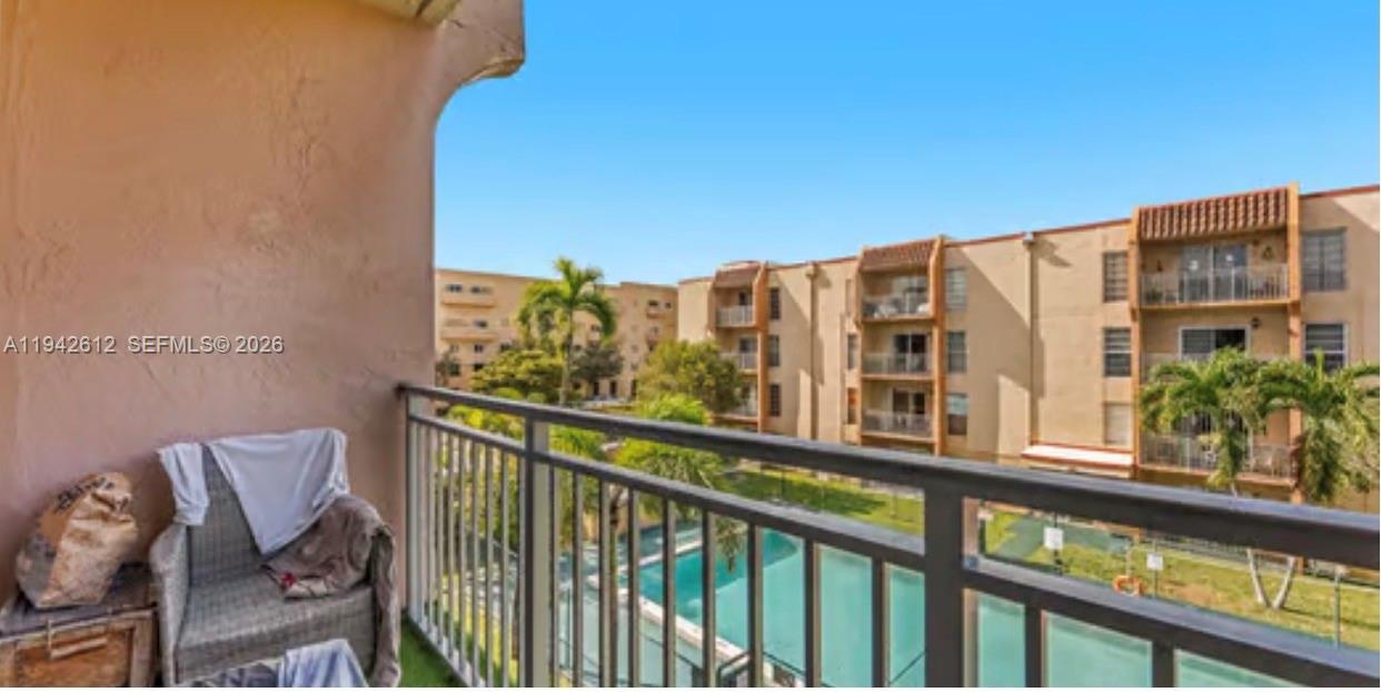 4841 Northwest 7th Street, Unit 3034 Miami, FL 33126 - Photo 35 of 35 a view of a building from a balcony