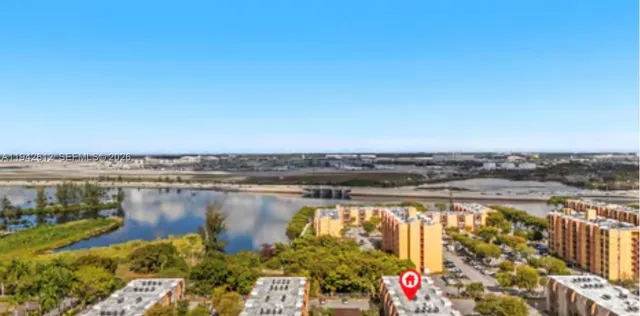 a view of a lake with a city