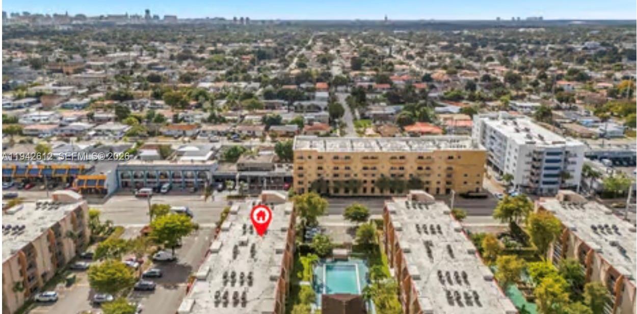 4841 Northwest 7th Street, Unit 3034 Miami, FL 33126 - Photo 7 of 35 an aerial view of a city