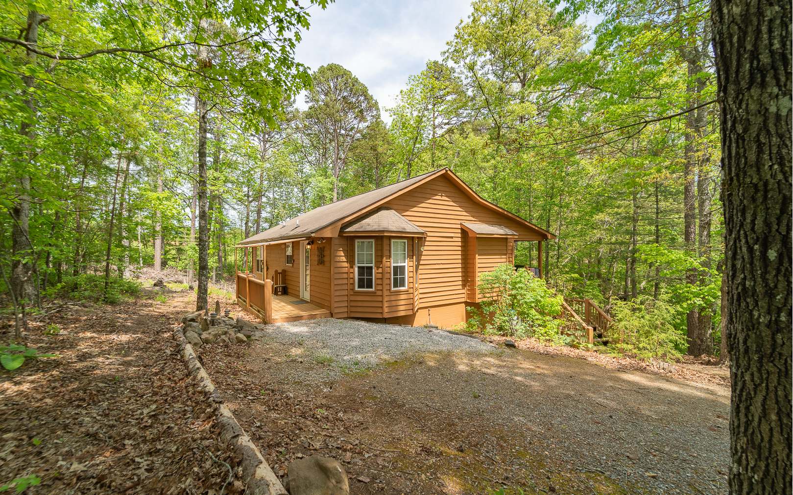 64 Driver Avenue Murphy, NC 28906 - Photo 2 of 4 a view of a house with a yard and large trees