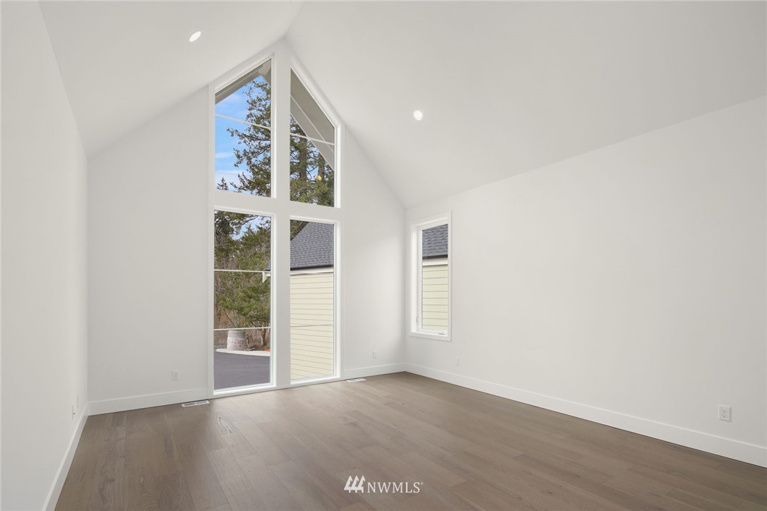 23521 7th Avenue Southeast Bothell, WA 98021 - Photo 20 of 27 an empty room with windows