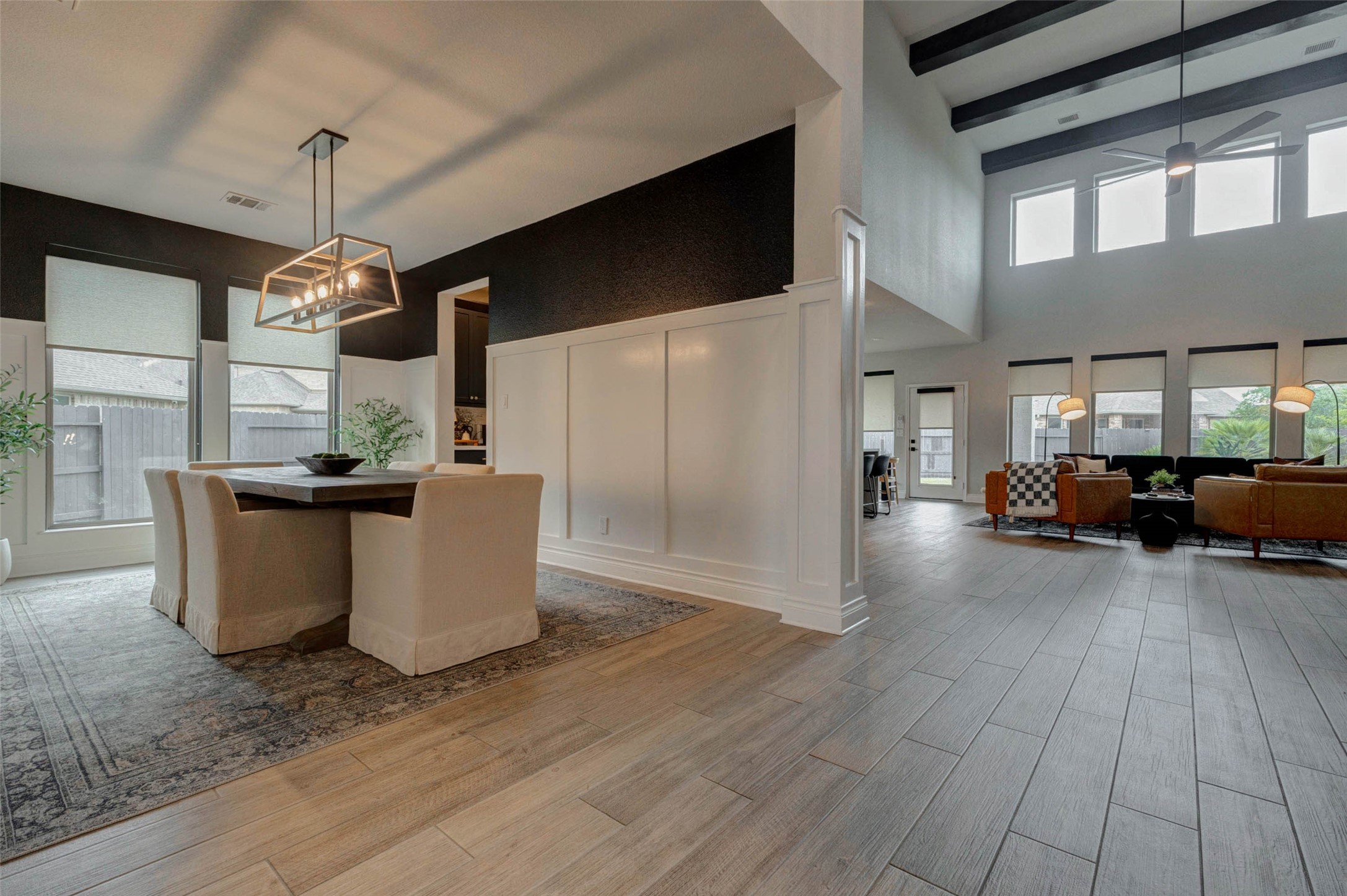 4303 Tupelo Leaf Court Manvel, TX 77578 - Photo 11 of 50 a view of a dining room with furniture window and wooden floor