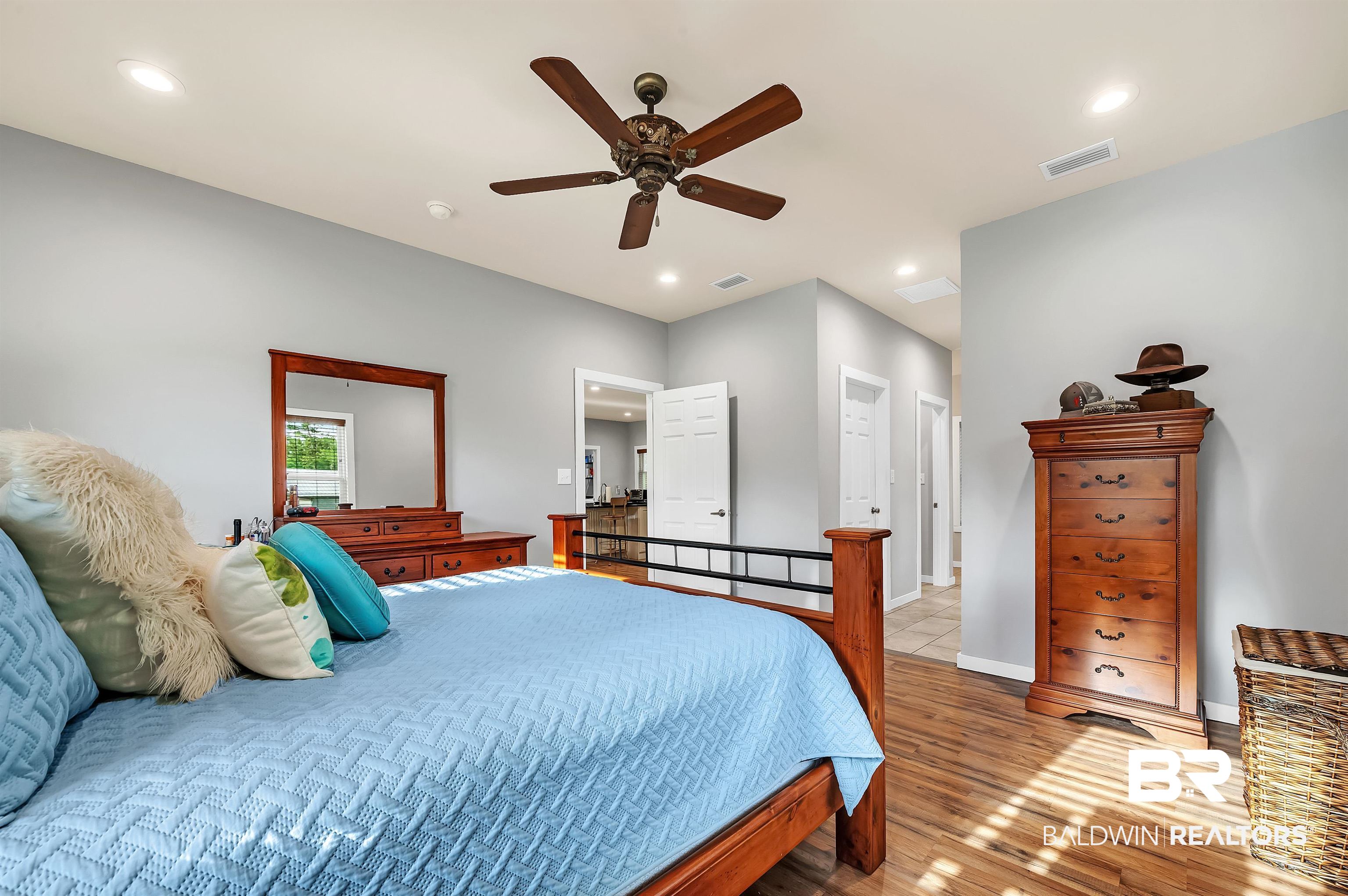13827 County Road 83 Elberta, AL 36530 - Photo 26 of 38 Bedroom with wood finished floors, recessed lighting, a ceiling fan, and baseboards