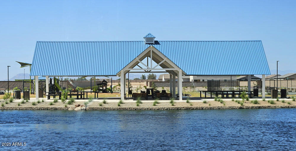 2603 Rustler Road San Tan Valley, AZ 85140 - Photo 34 of 34 a view of a house with a yard