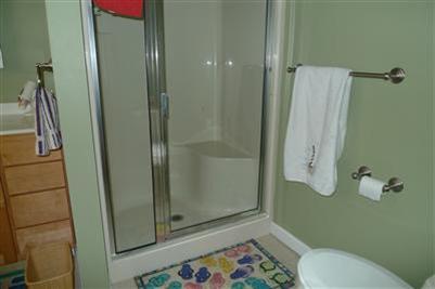 35 South Sunken Meadow Road Eastham, MA 02642 - Photo 13 of 22 a bathroom with a toilet and a shower
