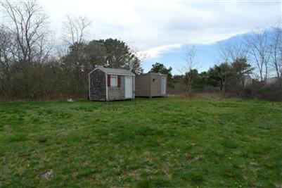 35 South Sunken Meadow Road Eastham, MA 02642 - Photo 17 of 22 a view of a house with a yard