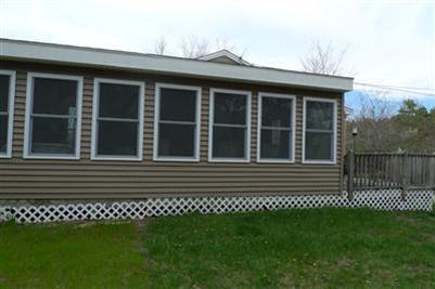 35 South Sunken Meadow Road Eastham, MA 02642 - Photo 3 of 22 a front view of a house