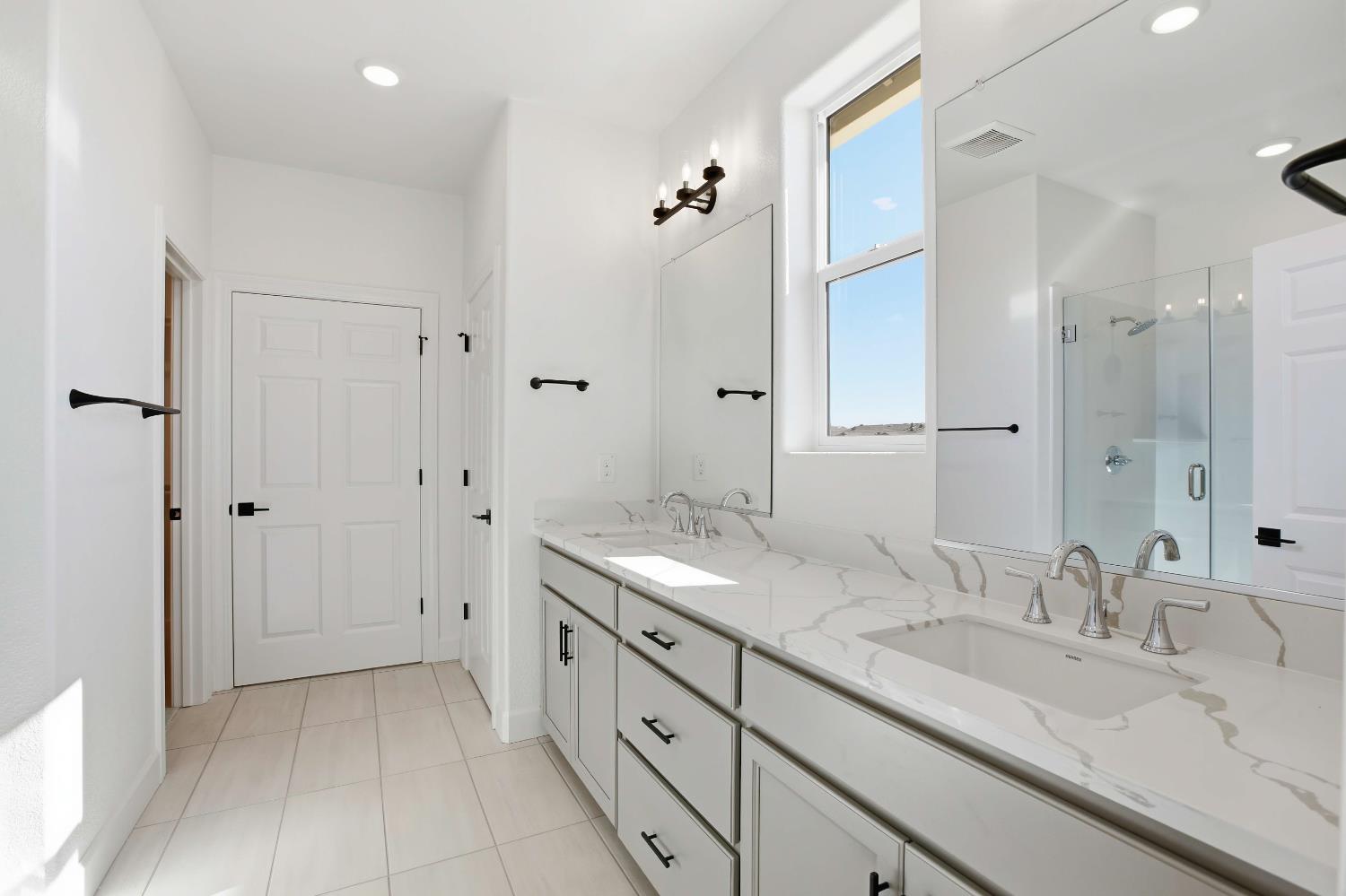 3195 Splendor Drive Lincoln, CA 95648 - Photo 14 of 26 a bathroom with a granite countertop sink mirror and double
