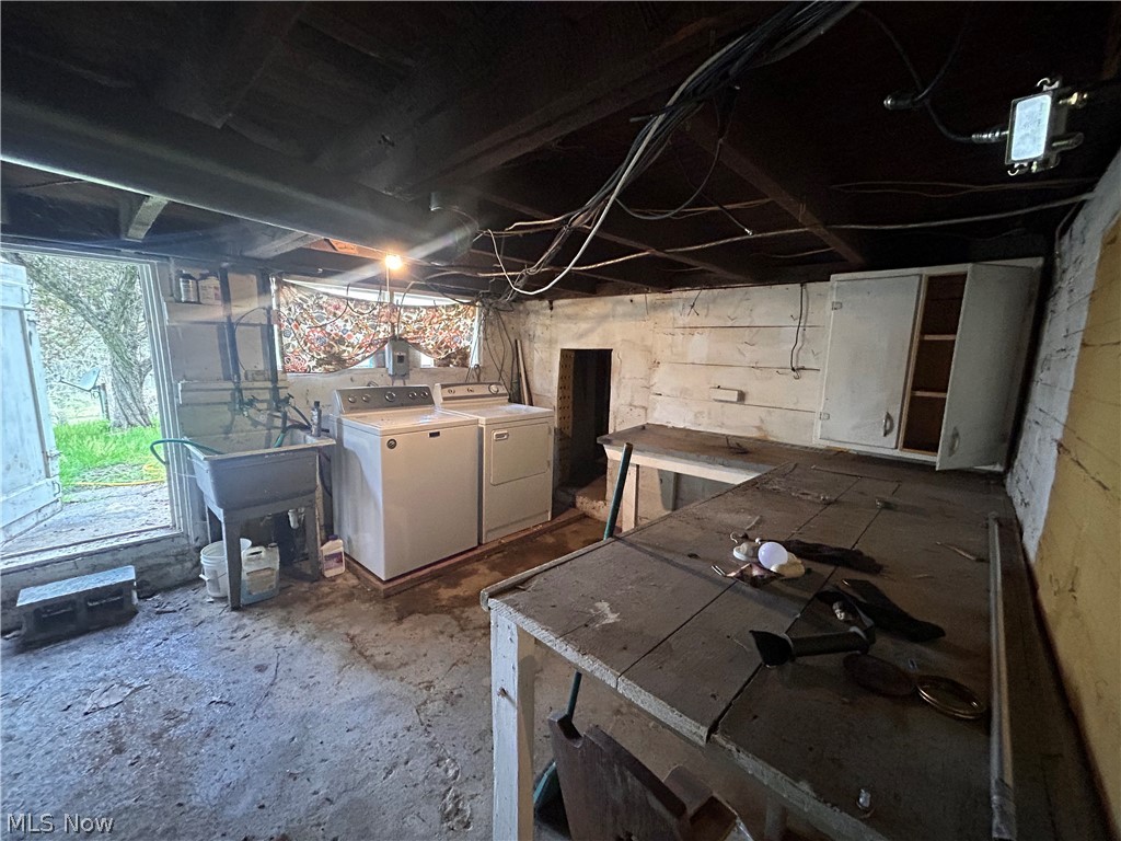 26057 Cadiz Road Freeport, OH 43973 - Photo 23 of 24 Basement featuring a washing machine and clothes dryer