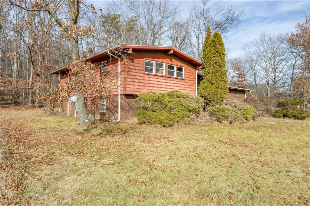 284 Myoma Road Mars, PA 16046 - Photo 4 of 33 a front view of a house with a yard