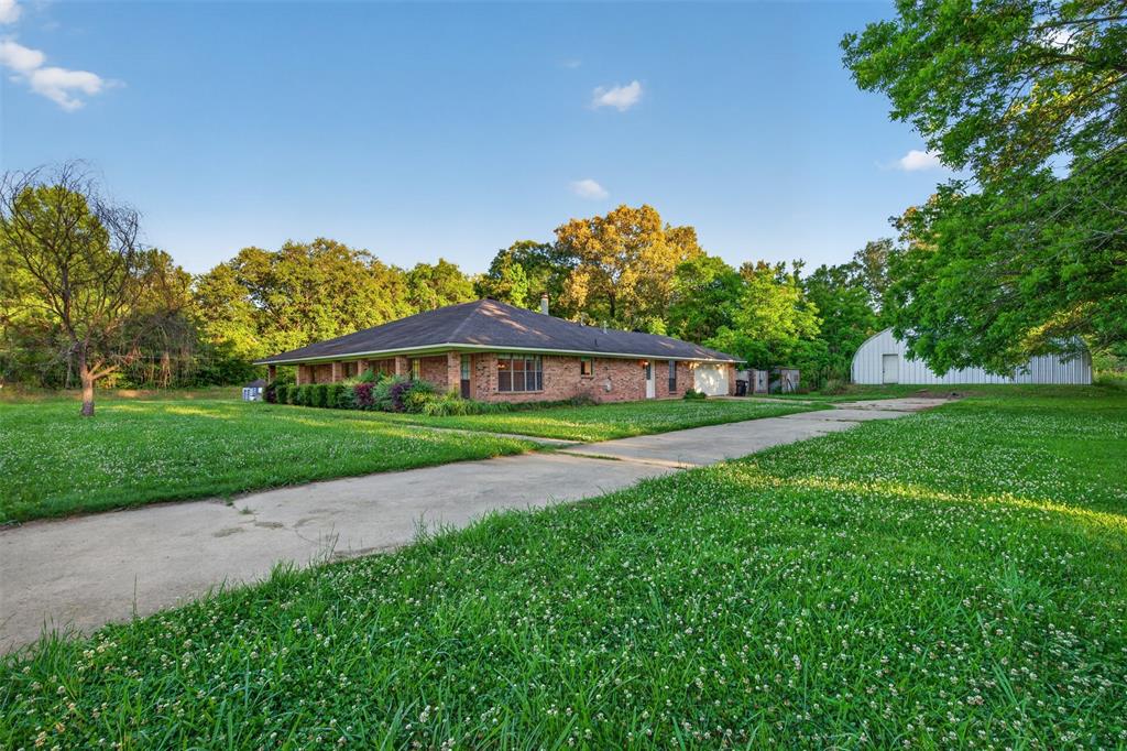 401 Cane Bend Drive Haughton, LA 71037 - Photo 27 of 27 a front view of house with yard and green space