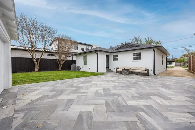 a view of house with yard