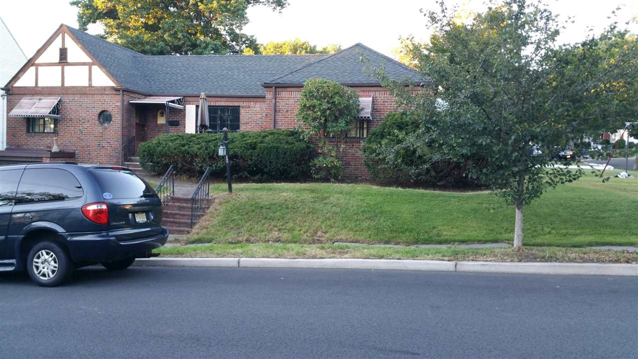 260 West Passaic Avenue Rutherford, NJ 07070 - Photo 1 of 1 a house view with a garden space
