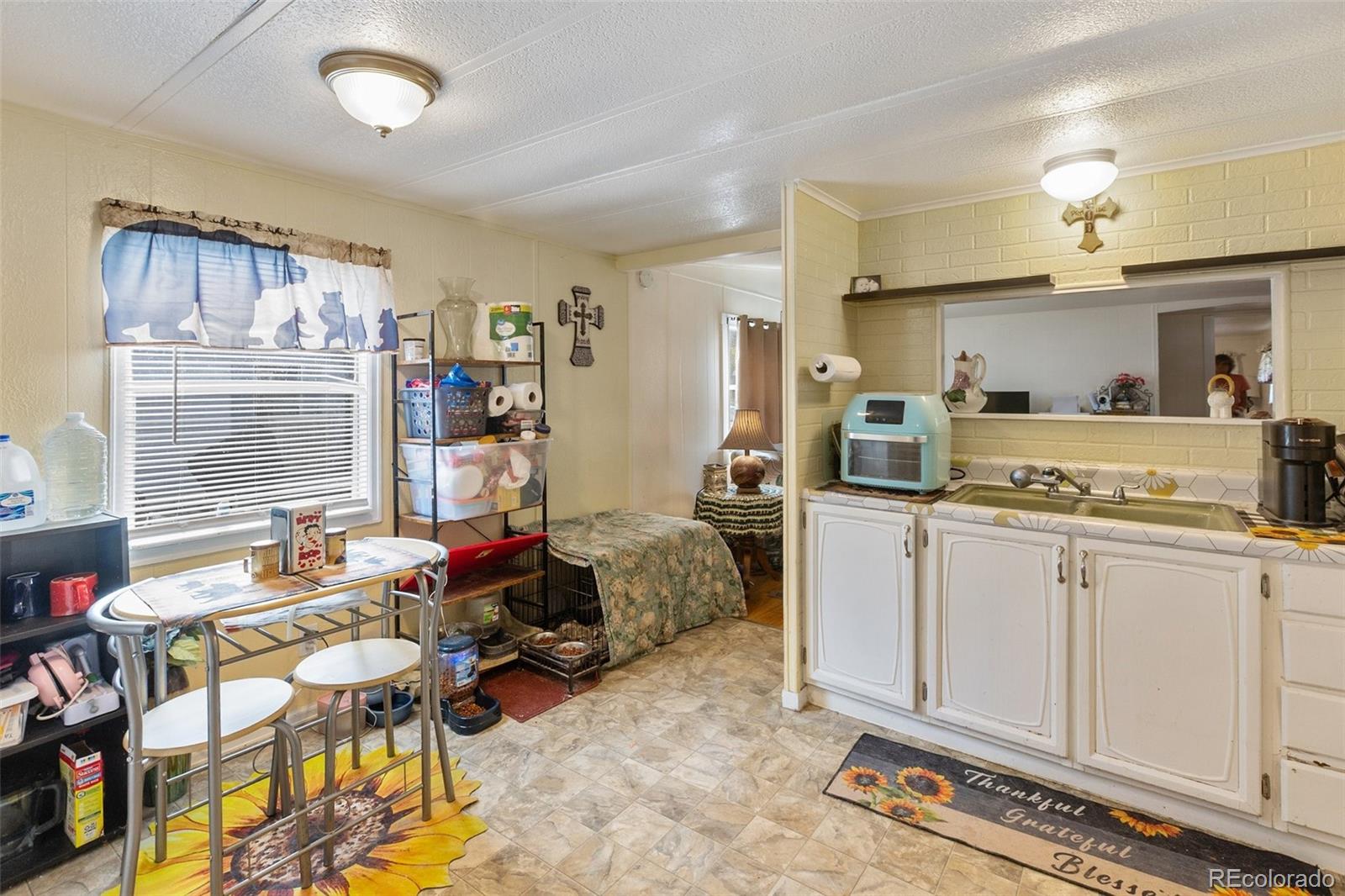 600 Raintree Boulevard, Unit 98 Canon City, CO 81212 - Photo 11 of 25 a very nice looking room with a large window