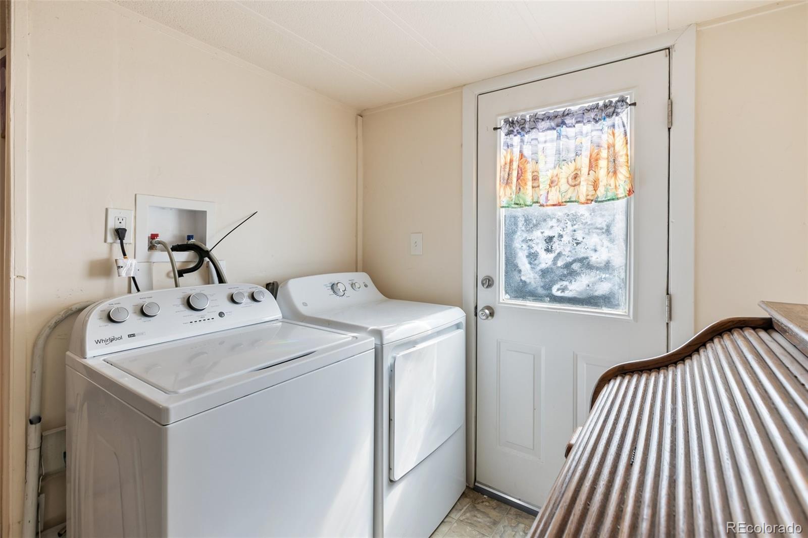 600 Raintree Boulevard, Unit 98 Canon City, CO 81212 - Photo 19 of 25 a utility room with dryer and washer