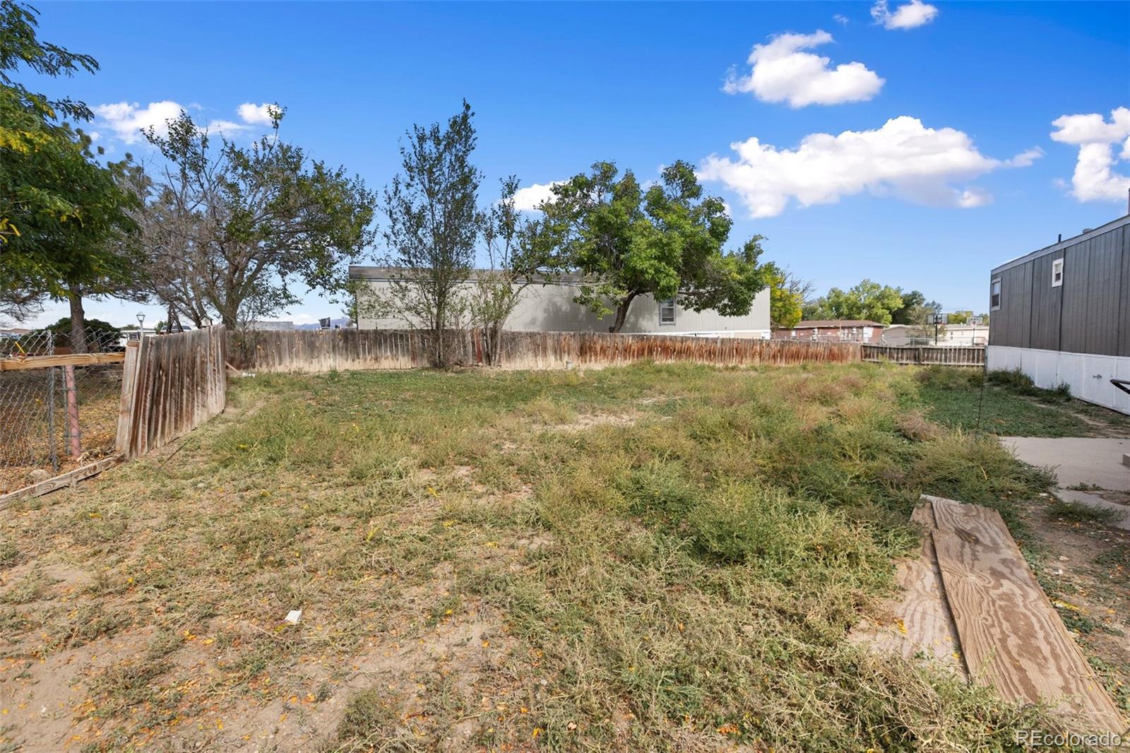 600 Raintree Boulevard, Unit 98 Canon City, CO 81212 - Photo 21 of 25 a view of backyard with outdoor and green space