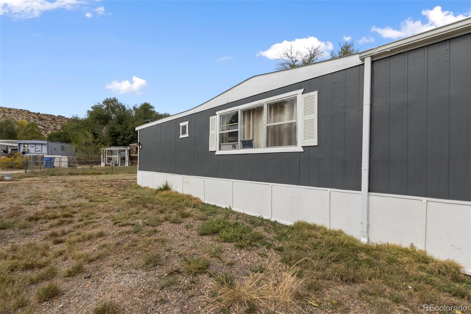 600 Raintree Boulevard, Unit 98 Canon City, CO 81212 - Photo 23 of 25 a house view with a outdoor space