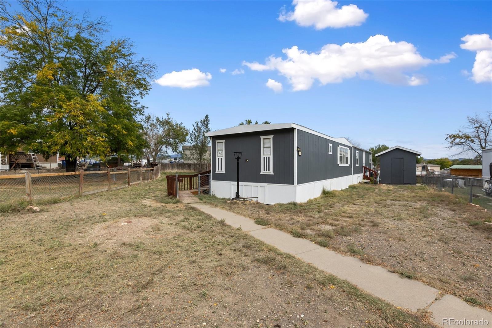 600 Raintree Boulevard, Unit 98 Canon City, CO 81212 - Photo 5 of 25 a view of a house with a backyard