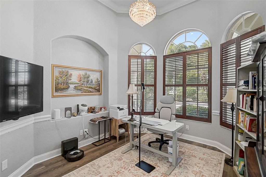 538 Dove Pointe Osprey, FL 34229 - Photo 13 of 74 a view of a livingroom with workspace and a window