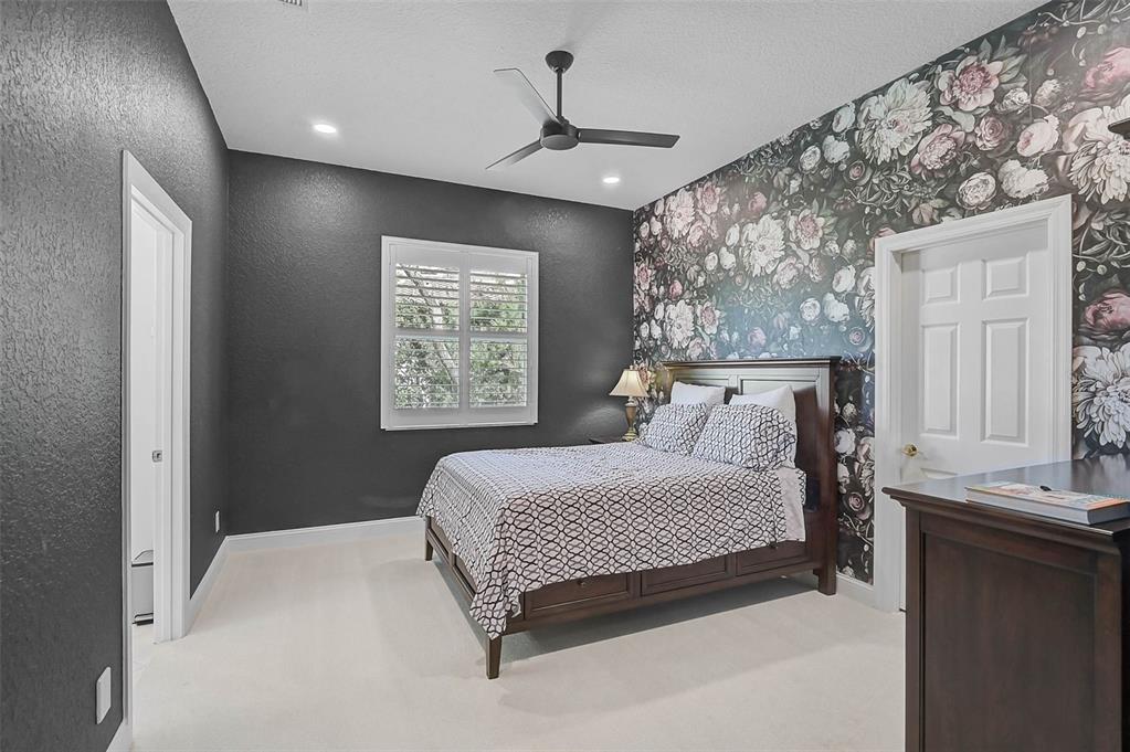 538 Dove Pointe Osprey, FL 34229 - Photo 30 of 74 a bedroom with a bed and a window