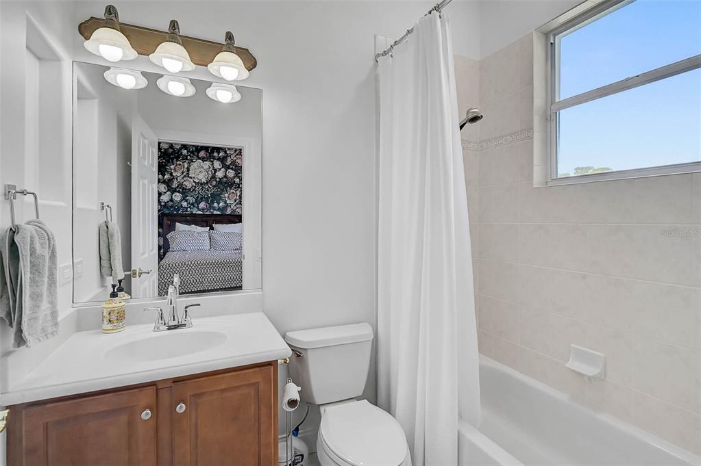 538 Dove Pointe Osprey, FL 34229 - Photo 31 of 74 a bathroom with a sink a toilet and shower