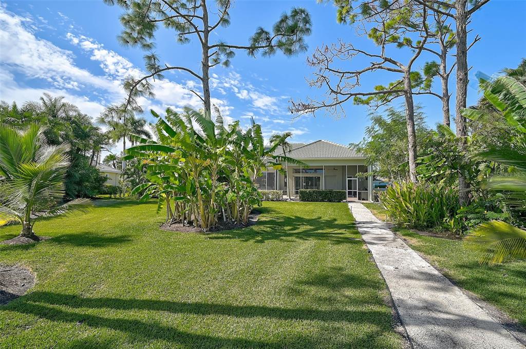 538 Dove Pointe Osprey, FL 34229 - Photo 45 of 74 a front view of a house with a yard