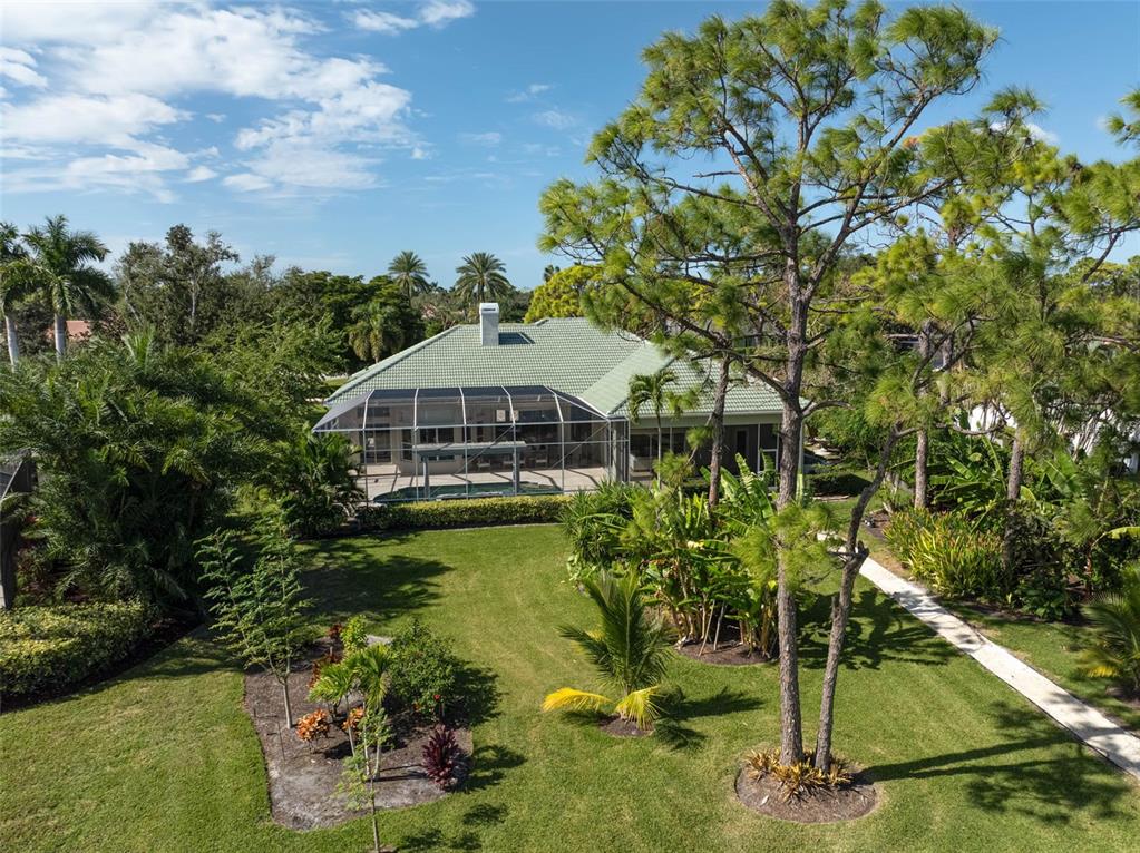 538 Dove Pointe Osprey, FL 34229 - Photo 50 of 74 a front view of a house with a yard