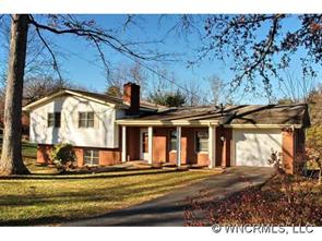 42 West Oakview Road Asheville, NC 28806 - Photo 1 of 12 a view of a house with a yard