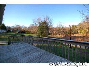 42 West Oakview Road Asheville, NC 28806 - Photo 2 of 12 a view of a balcony with wooden floor