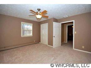 42 West Oakview Road Asheville, NC 28806 - Photo 10 of 12 a view of an empty room with a window