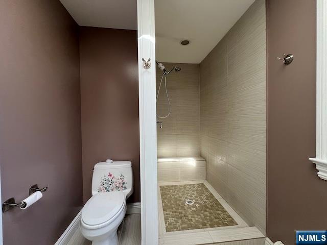 159 Henry Street Teaneck, NJ 07666 - Photo 12 of 19 a bathroom with a toilet and a shower
