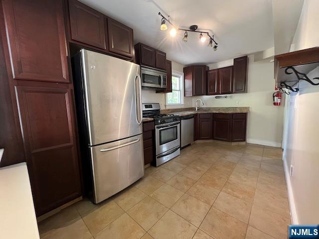159 Henry Street Teaneck, NJ 07666 - Photo 4 of 19 a kitchen with stainless steel appliances granite countertop a refrigerator a stove a sink dishwasher and a refrigerator