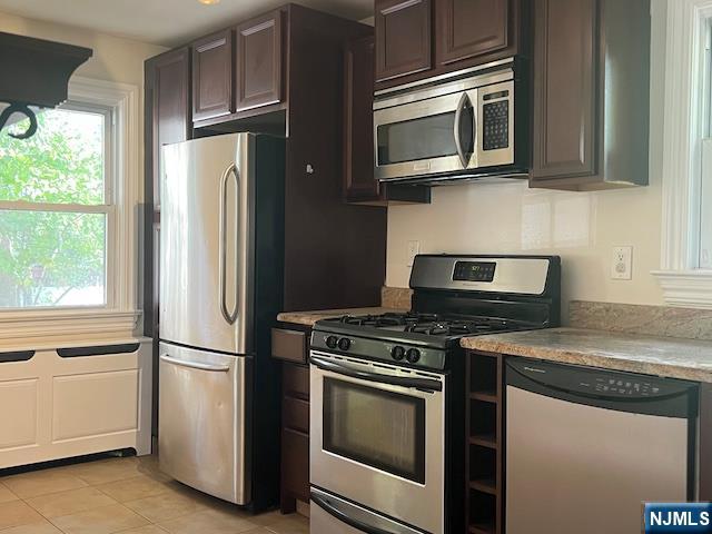 159 Henry Street Teaneck, NJ 07666 - Photo 6 of 19 a kitchen with appliances cabinets and a counter top space