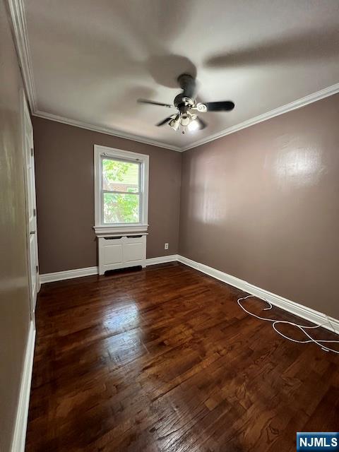 159 Henry Street Teaneck, NJ 07666 - Photo 7 of 19 a view of empty room with wooden floor and fan