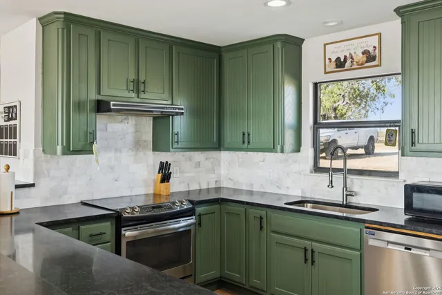 a bath tub sitting next to a window