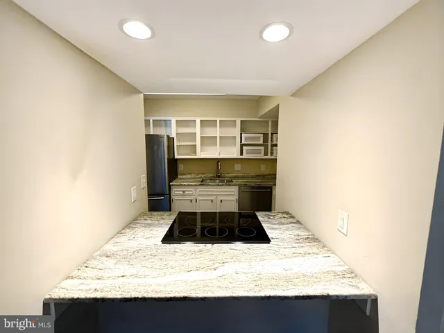 a view of kitchen and sink