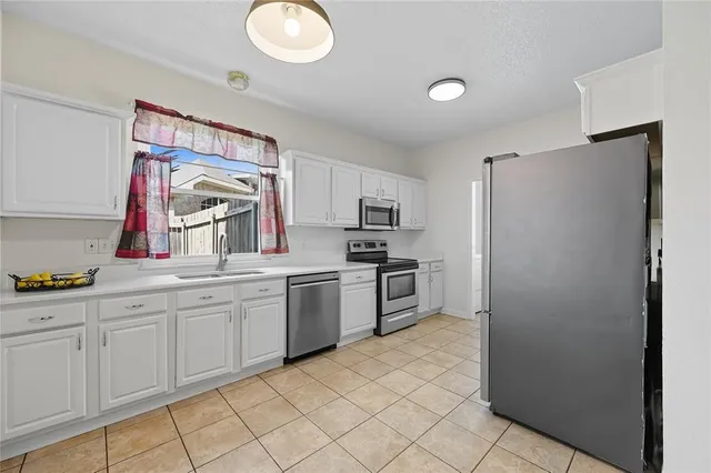 $440,000 | 1432 Stone Canyon Way, Lewisville, TX 75067