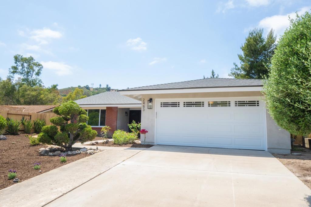 a front view of house with yard